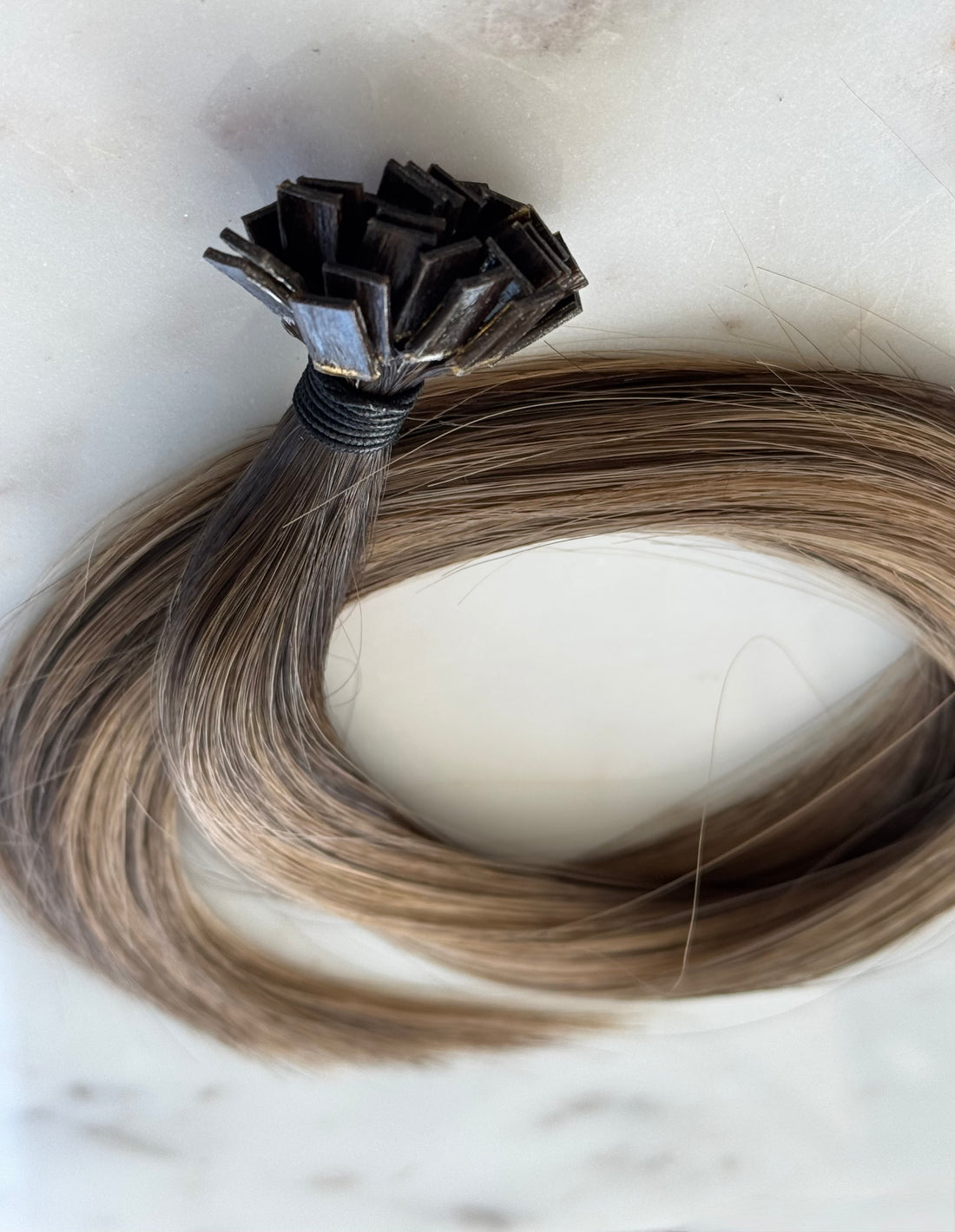 Warm blonde keratin tip hair extensions