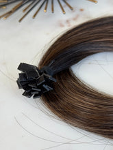 Load image into Gallery viewer, Detail view of the keratin tips on the Bree cool brunette K-tip hair extensions