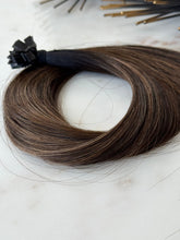 Load image into Gallery viewer, Close view of the Bree cool brunette K-tip hair extension color and texture