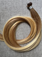 Load image into Gallery viewer, Brooke hand tied hair extension in a warm bronde blend, full product view