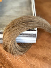 Load image into Gallery viewer, Detail view of the Chai Tea dirty blonde hand-tied hair extension weft color blend