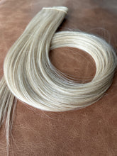 Load image into Gallery viewer, Champagne hybrid weft showing the looped hair and color