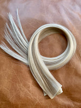 Load image into Gallery viewer, Holly 22-inch hybrid weft hair extensions showing blonde color detail