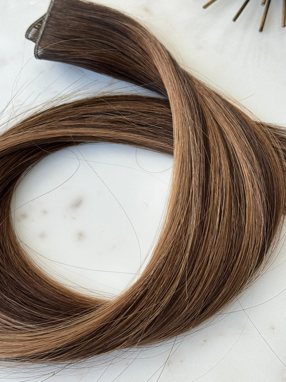 Jodie 22-inch hybrid weft showing the rooted brown ombre color blend
