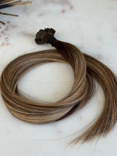 Load image into Gallery viewer, Close-up of KALLEE 18-inch K-tip hair extensions showing the warm brown balayage color