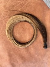 Load image into Gallery viewer, Kallee hand tied hair weft overhead view showing the brunette and blonde blend