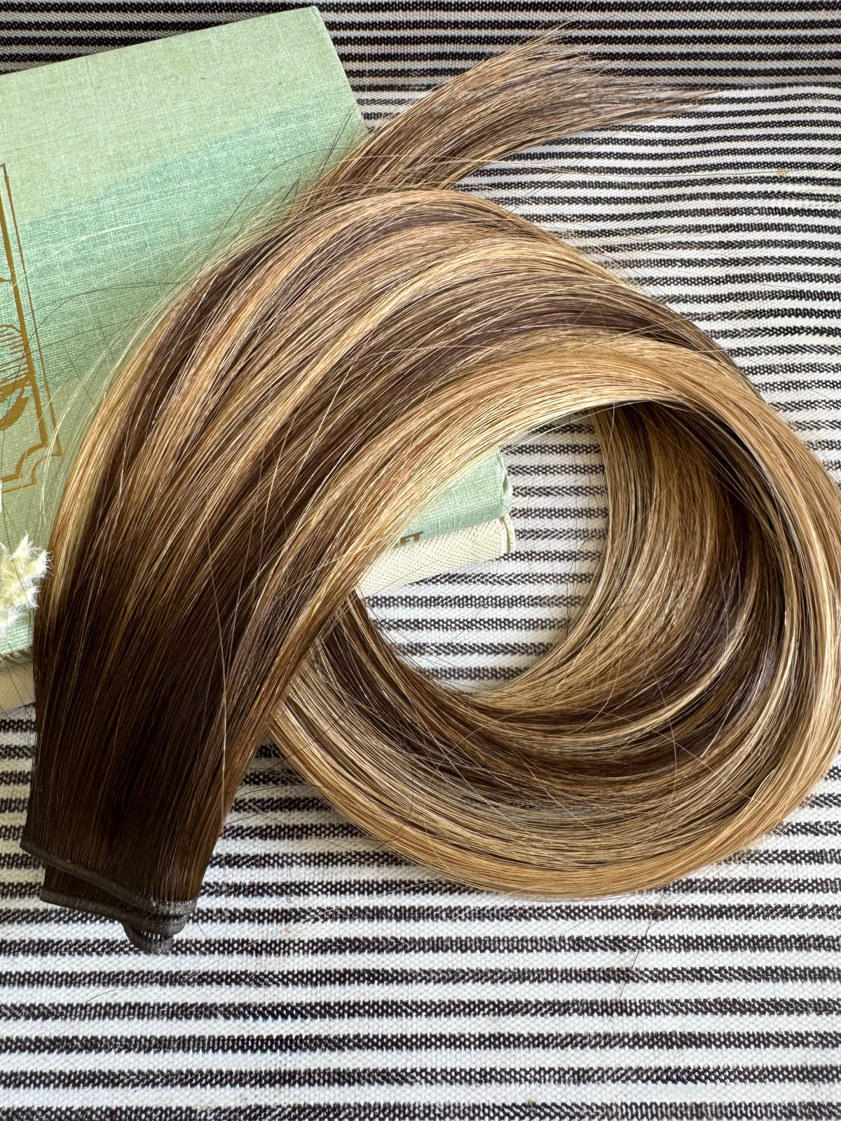 Kallee 22-inch hybrid weft hair extension in warm rooted ombre, full product view