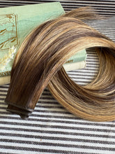 Load image into Gallery viewer, Kallee 22-inch hybrid weft hair extension in warm rooted ombre, alternate full product view