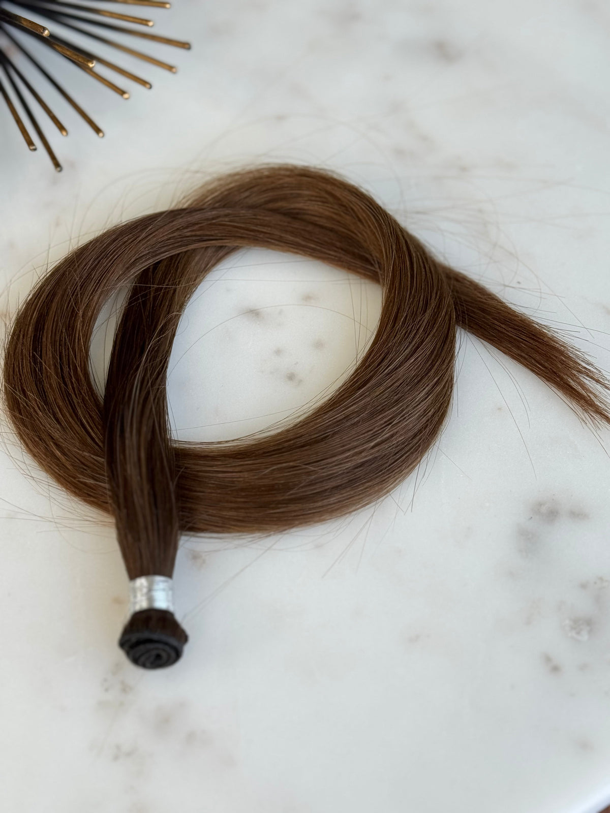 Megan 20-inch hand-tied weft shown from an angled full-product view