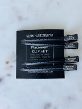Load image into Gallery viewer, Four Meraki Move Up Clips arranged on the placement instruction card
