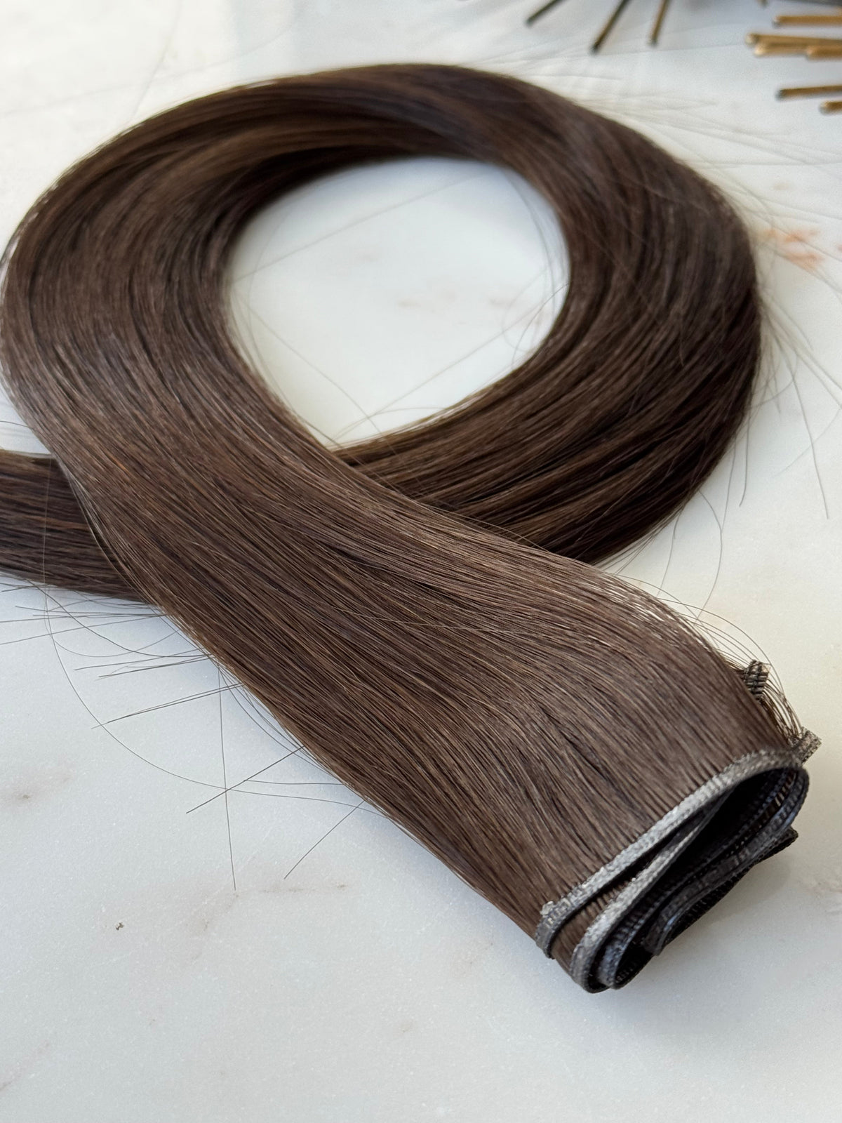 Rachele hybrid weft dark brown hair extensions, full product view