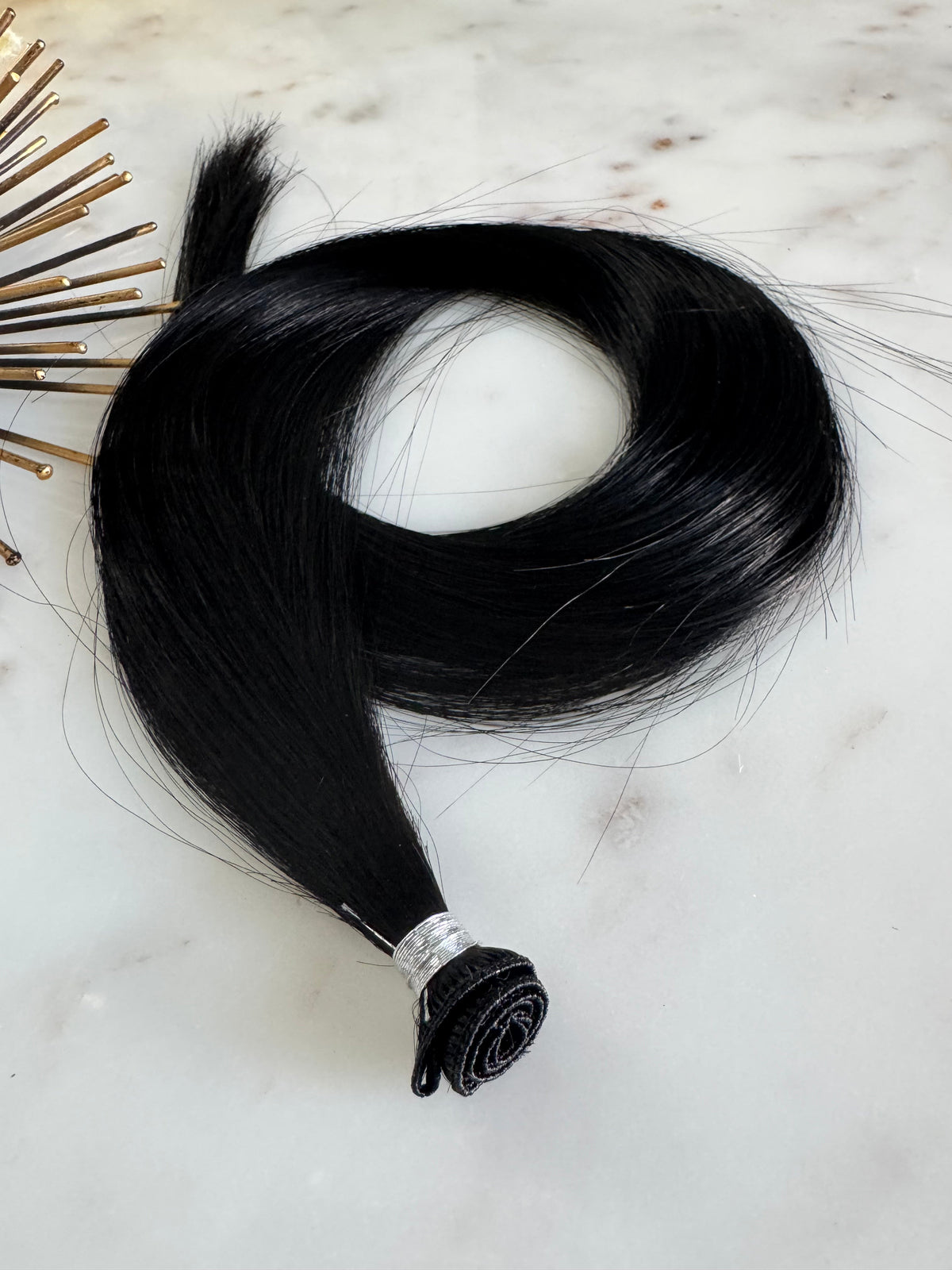 Tereece black hand-tied weft extension detail